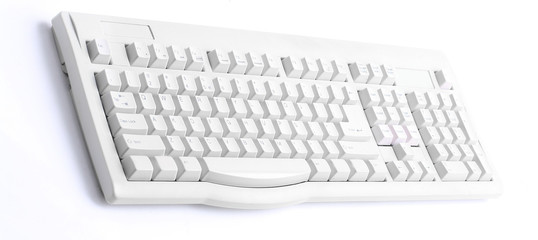 old computer keyboard on a white background.