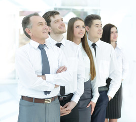 successful business team looking at copy space.