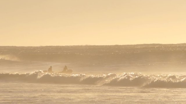 Search & Rescue surf life saving lifeguard at beach on boat
