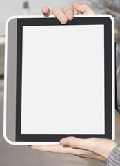 close up. woman showing a digital tablet outdoors