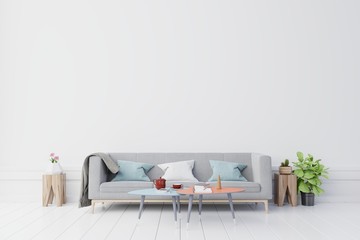 Gray sofa and wooden table with Flower,coffee,book on empty wall in simple living room interior,3d rendering