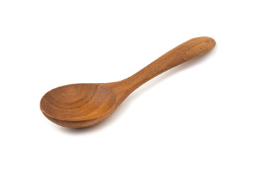 Brown wooden spoon on white background