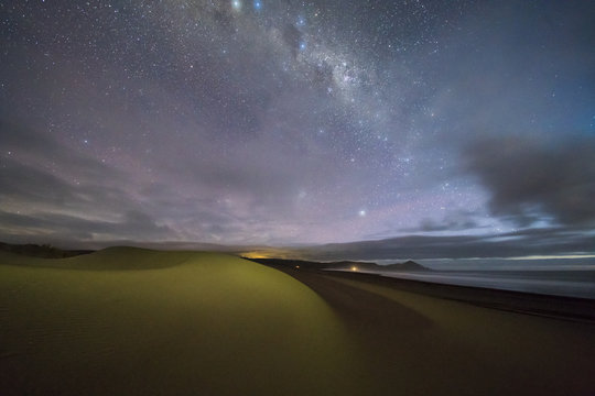 The Milky Way rises below the horizon at "Topocalma" beach, Chile
