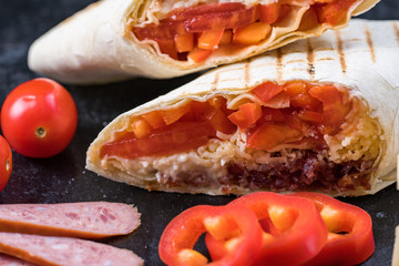 Delicious shawarma on a black background