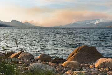 Forest fire smoke from multiple fires fills the sky over Okanagan Lake in the South Okanagan