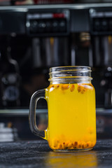Fragrant sea buckthorn juice in a transparent Cup