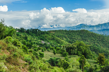 Fototapeta na wymiar Arieal View of Beautiful Nepali Village sorrounded by the Green Forest,Mountain Village,Gorkha Nepal