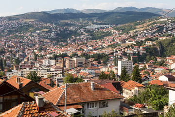 Fototapeta na wymiar A distant view of Saravejo old town from a residential district on a hill south of Bosnia and Herzegovina capital city in Eastern Europe