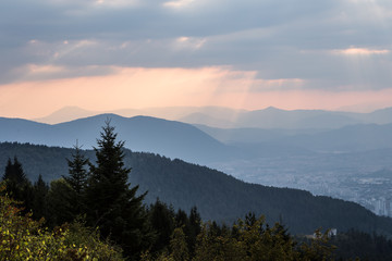 Sunset from the hills surrounding Sarajevo, visible on the bottom right, in Bosnia and Herzegovina capital city in Europe