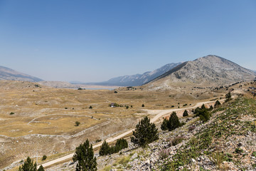 Arid landscape in Bosnia and Herzegovina on a sunny summer day near Mostar.