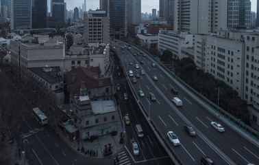 Aerial view of highway and buildings in West Yan`an road, Shanghai city on a cloudy day