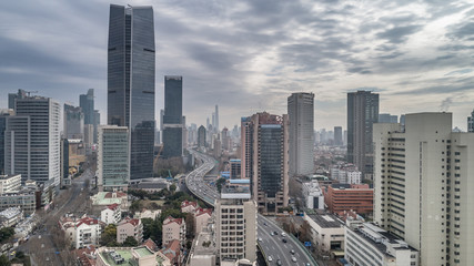 Aerial view of highway and buildings in West Yan`an road, Shanghai city on a cloudy day