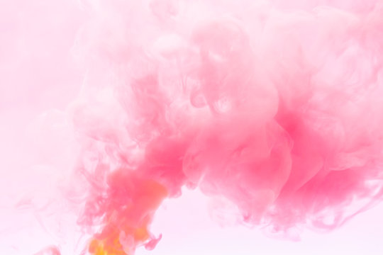 Pink smoke abstract on white background, swirling pink and white smoke background.