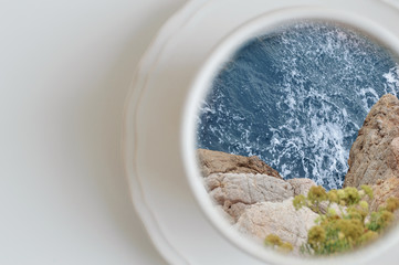 Ocean in a cup concept. Sea in a mug, creative idea. Top view, copy space