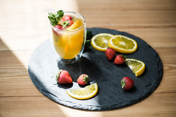 slate board.close-up view of delicious refreshing summer cocktail in glass on slate board.close-up view of delicious refreshing summer cocktail in glass on slate board.close-up view of delicious refre