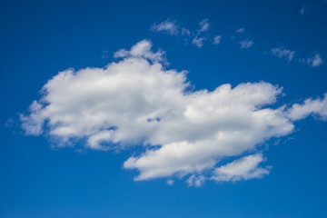 White clouds on the blue sky during the day