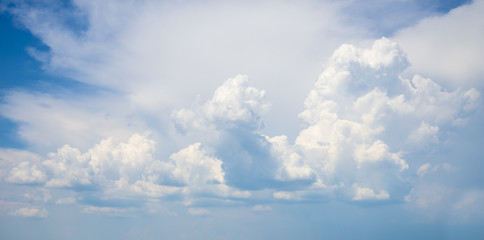 Naklejka na ściany i meble White clouds on the blue sky during the day