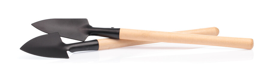 Steel shovel with a wooden handle isolated on a white background.