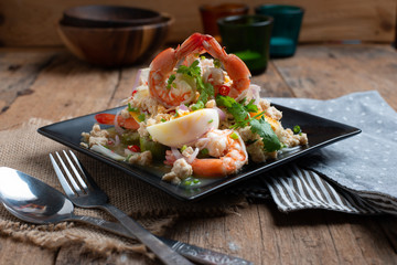 Close up of  Thai Local food, Spicy Green Eggplant Salad with Prawns