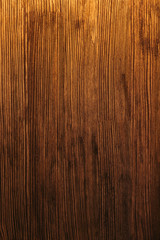 close-up view of dark brown wooden textured background