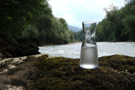 Picture of a glass flask with water.