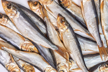 Smoked fish Baltic herring as background image