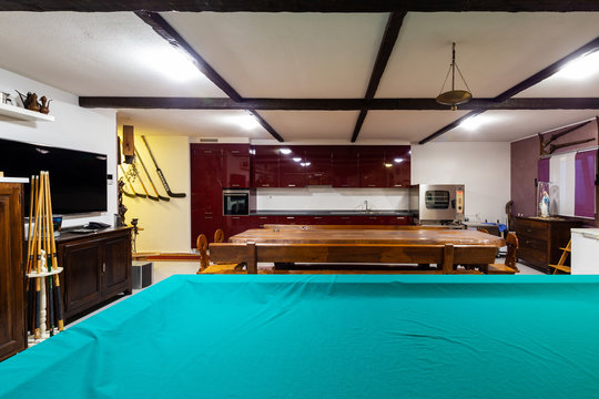 Tavern in a private house with a large wooden table