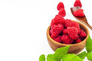 Fresh raspberries on a white background. Forest fruit. Healthy food. Sale of raspberries.