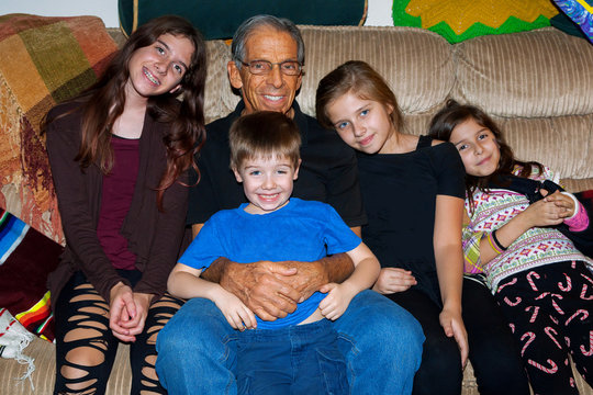 A Happy Grandfather with Four of His Grandkids