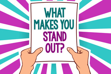 Word writing text What Makes You Stand Out question. Business concept for asking someone about his qualities Man holding paper important message remarkable blue purple rays bright idea.