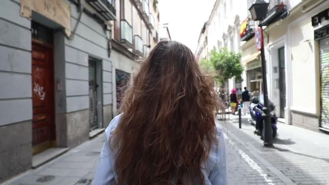 Young Woman walking in Madrid. slow Motion