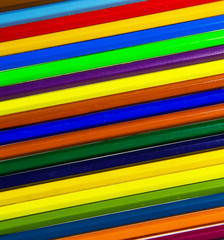 Colored wooden pencils  in the background