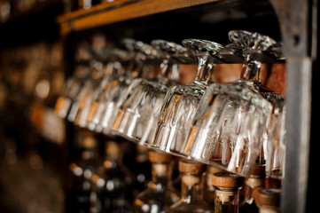 Set of empty and clean glasses arranged in line