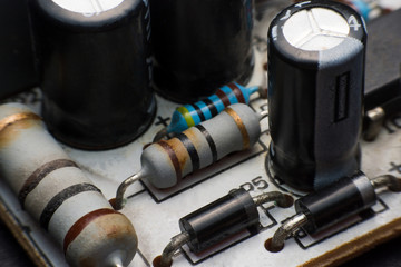 Resistor, Capacitor and Diode on Circuit Board close up. electronic hardware
