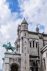 Fototapeta premium Detail of Basilica Sacre Coeur - Roman Catholic Church and minor Basilica, dedicated to Sacred Heart of Jesus. Paris, France.