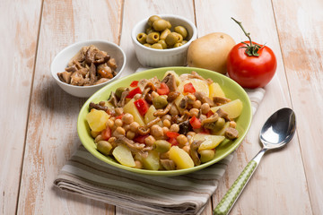 salad with chickpeas potatoes tomatoes mushroom and olives