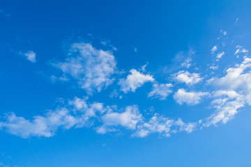 Naklejka na ściany i meble altocumulus clouds on blue sky background