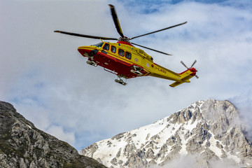 Fototapeta na wymiar Helicopter Rescue on the Mountain