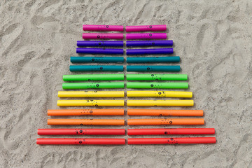Boomwhackers outside in the sand