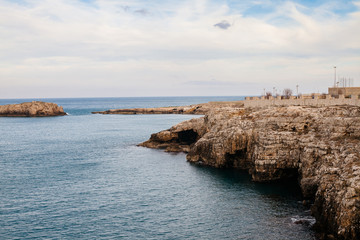 Beautiful landscape in Polignano a Mare, Apulia, Italy - Puglia region. Rock and blue sea. Sunny...