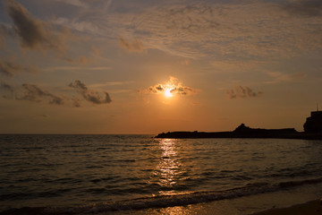 Fototapeta na wymiar Sunset on Greek beach