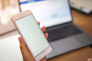 woman hands holding smart phone with blank copy space screen