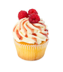 Cupcake with fresh raspberries and raspberry syrup isolated on white