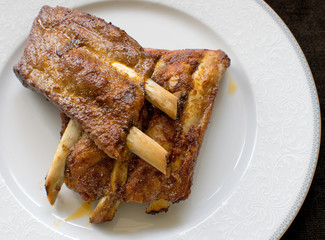 Detail of roasted ribs on the plate