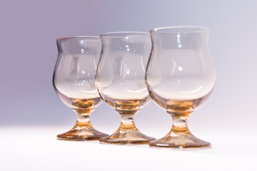 Glass wine glasses on white background.