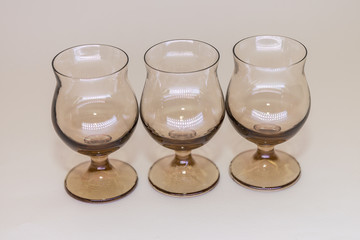 Glass wine glasses on white background.