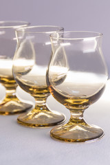 Glass wine glasses on white background.