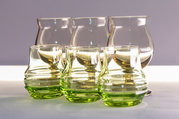 Glass wine glasses on white background.
