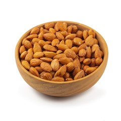 Almonds in wooden bowl isolated on a white background