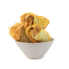 Dried shredded pork and baked bread isolated on a white background